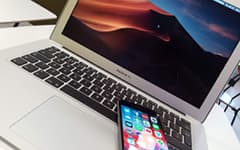 Apple MacBook laptop computer and iPhone